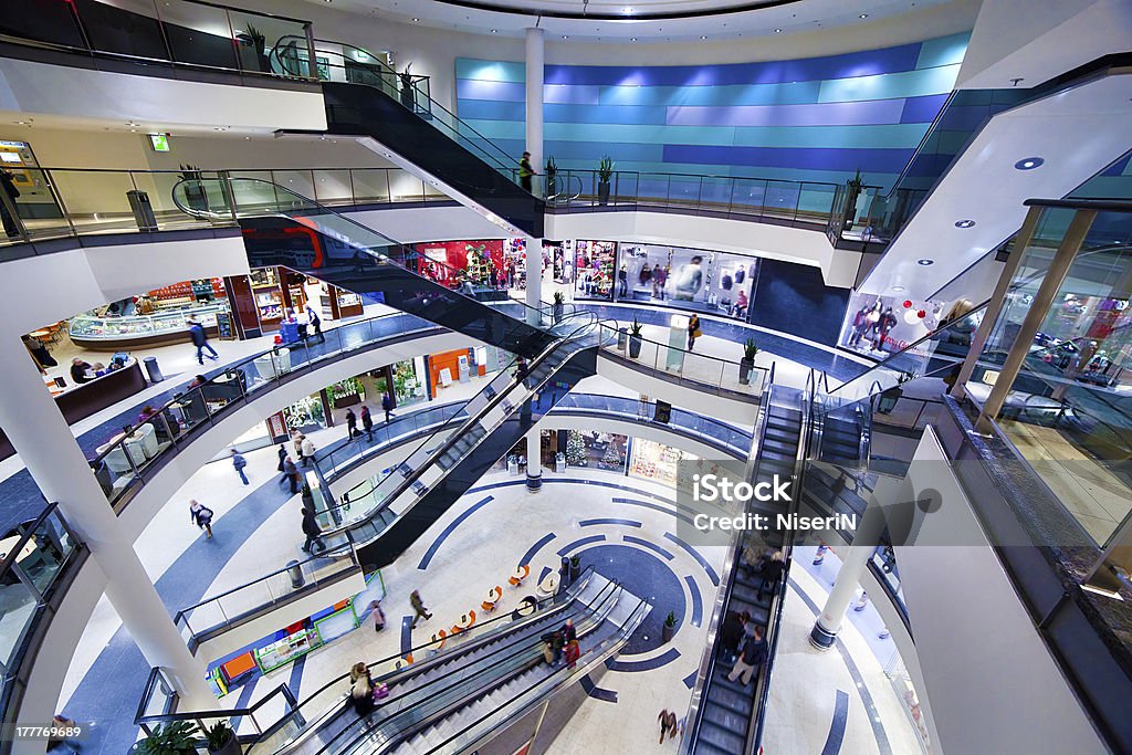 Modern shopping mall interior Modern shopping mall interior. Busy sale time Shopping Mall Stock Photo