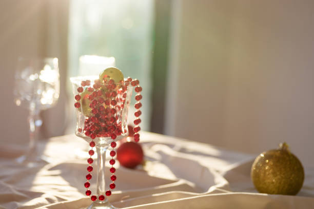 Christmas decoration in glasses on the table whit shadow