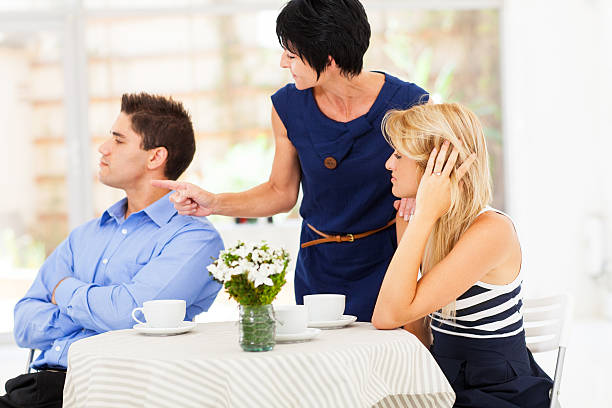 mother pointing finger at son-in-law mother pointing finger at son-in-law as she took daughter's side when couple fighting annoying mother in law stock pictures, royalty-free photos & images