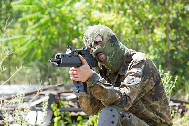 istock Terrorist with a gun outdoors 177771739