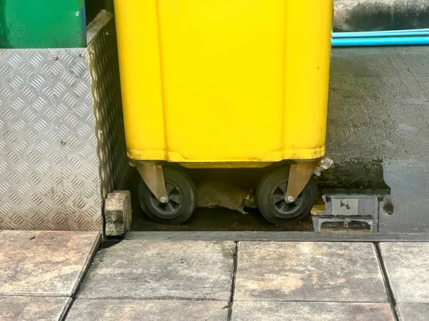 istock the wheels of a yellow container are visible. 1777721244