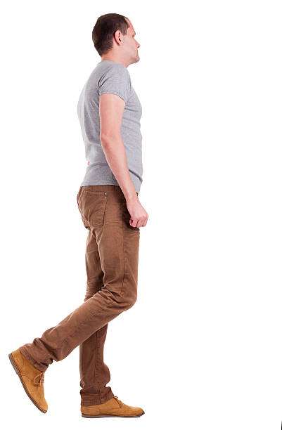 istock Back view of going  handsome man in jeans and Shirt 177772378