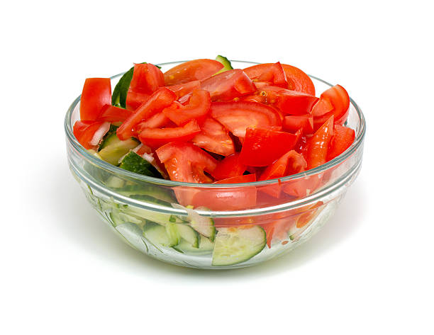 istock vegetable salad in a glass bowl isolated on white background 177772638