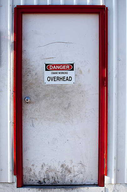 istock White Door with Danger Sign 177774003