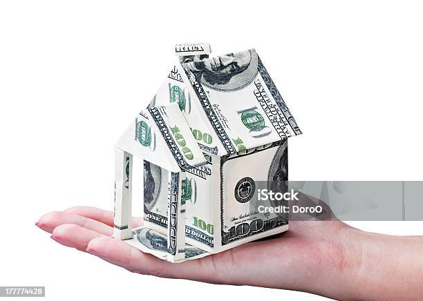 House Made Of Money In Hand Stock Photo - Download Image Now - Business, Buying, Construction Industry