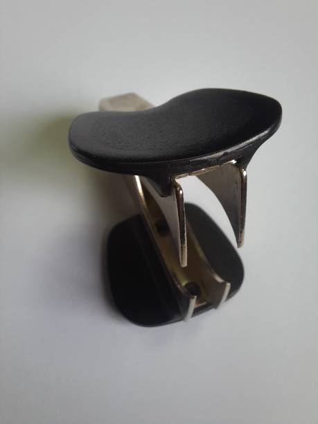 istock Black metal staple remover /extractor tool on white background 1777750200