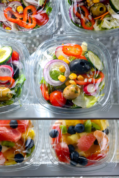 istock Boxes with pre-packaged vegetable salads in a commercial fridge 1777756038