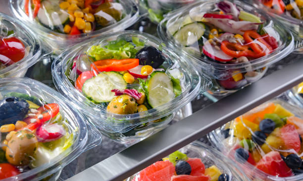 istock Boxes with pre-packaged vegetable salads in a commercial fridge 1777756060