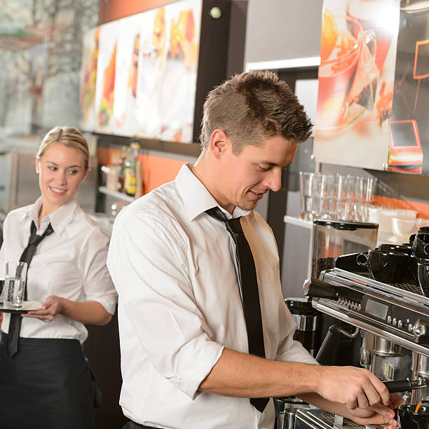 istock Young waiter and waitress working in bar 177775953