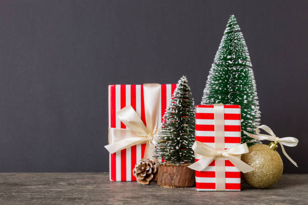 istock Christmas composition. craft Gift box, small tree, branches and craft DIY decorations on white background. New year concept. Christmas home decoration Flat lay, top view, copy space 1777771653