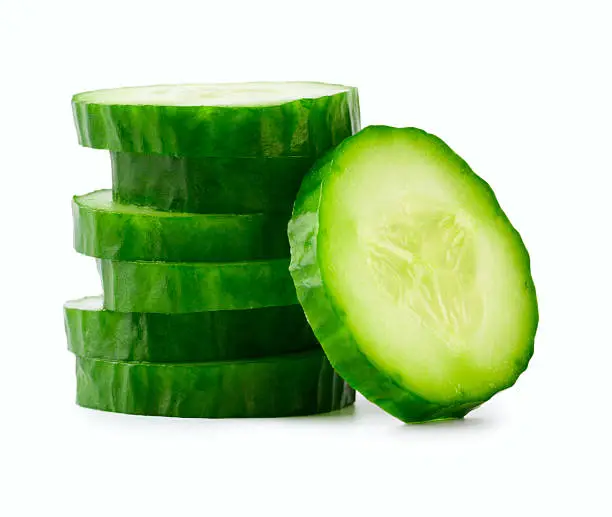 Sliced Cucumber in Stack isolated on white