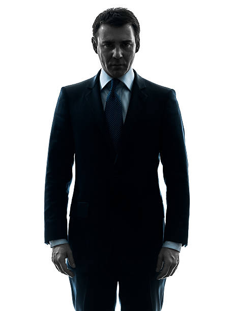 business man serious looking at camera silhouette