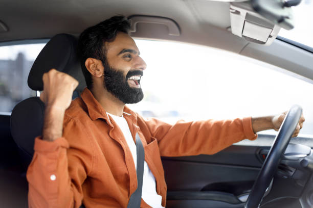 istock Emotional Arabic Driver Man Gesturing Yes Driving Auto, Side View 1777777802