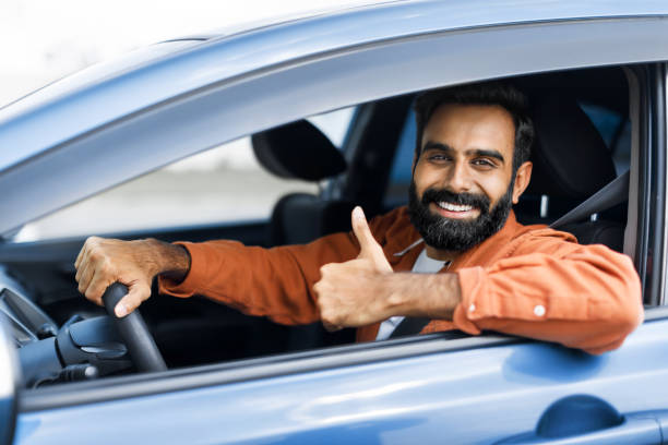 istock Middle Eastern Man Approving Car Gesturing Thumbs Up In Automobile 1777778468