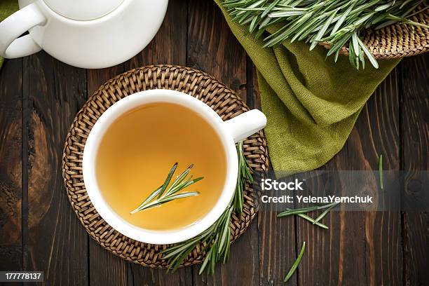 Top View Of Cup Of Rosemary Tea On Wooden Table Stock Photo - Download Image Now - Rosemary, Tea - Hot Drink, Infused