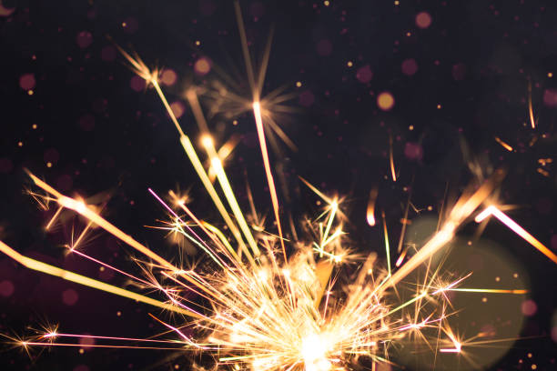 istock Burning sparkler with golden bokeh light background. 1777788267