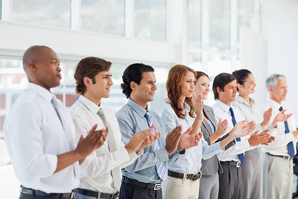 istock Clapping business people in a line 177779338