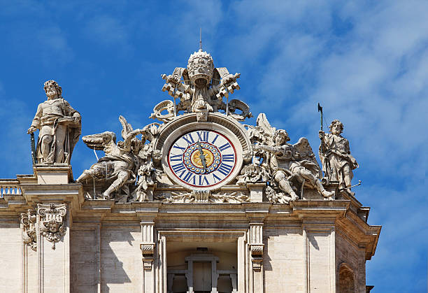 istock Clock on facade of Saint Peter basilica. Vatican, Italy 177779373