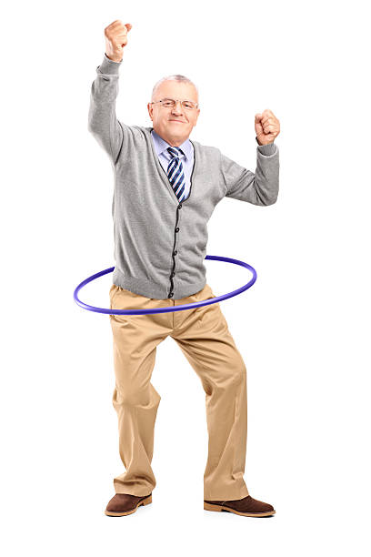 istock Mature gentleman dancing with a hula hoop 177779690