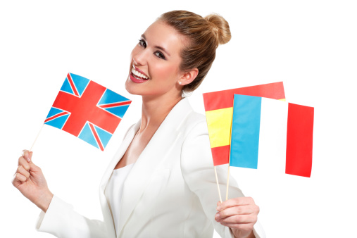 beautiful woman showing international flags on white