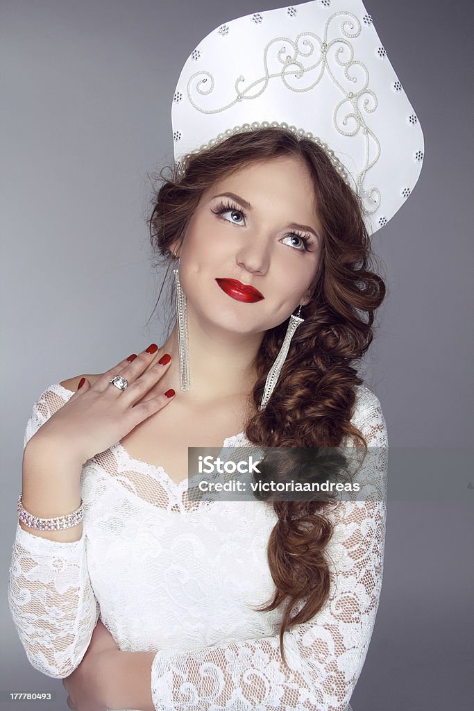 Russian Beauty. Attractive female wearing in kokoshnik. Russian Beauty. Attractive female wearing in kokoshnik. Woman's headdress in old Russia Adult Stock Photo