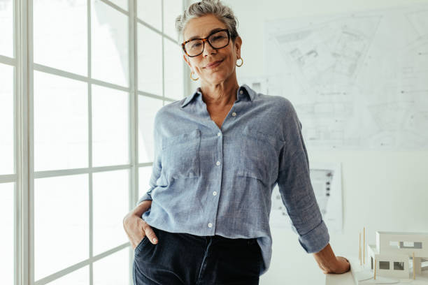 istock Confident in her creative expertise: Female architect looking at the camera in her office 1777808564