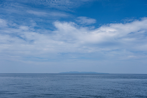 Awashima seen from the sea in the distance