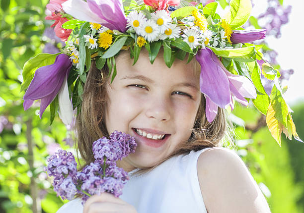 istock girl with a wreath 177784572
