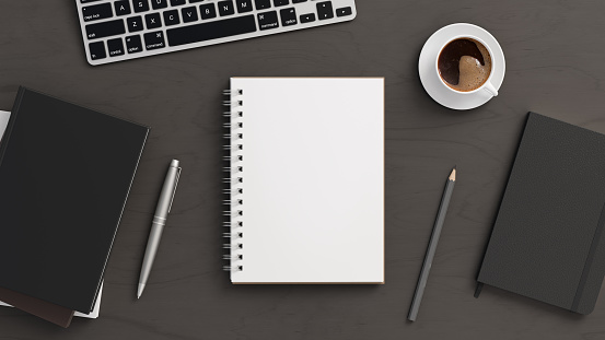 Notebook mockup. Blank workplace notebook. Spiral notepad on dark wooden desk. 3d illustration
