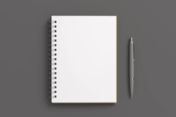 istock Notebook mockup. Opened blank notebook and pen. Spiral notepad on gray background 1777847213