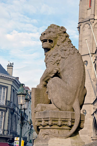 istock ancient lion sculpture in Bruges street 177785646