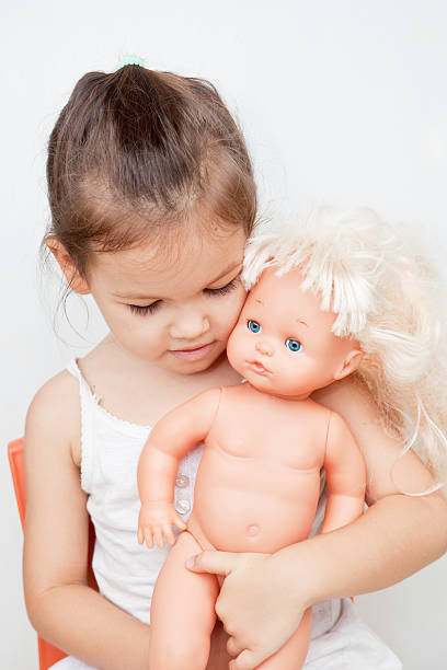 istock The Girl with a Doll 177785685