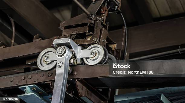 Mechanical Pulley System Old Factory Roof Stock Photo - Download Image Now - Factory, Hanging, Horizontal