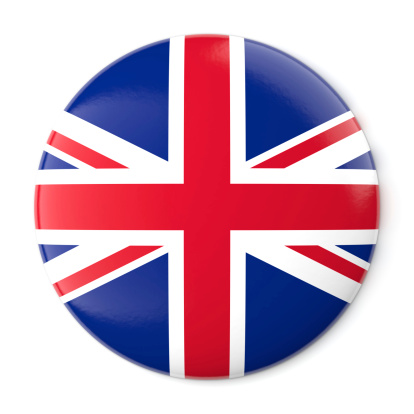 A pin button with the flag of the United Kingdom. Isolated on white background with clipping path.