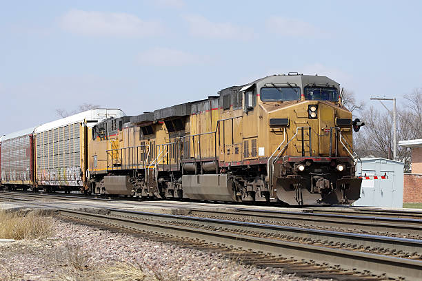 istock Two locomotives with a freight train 177787718