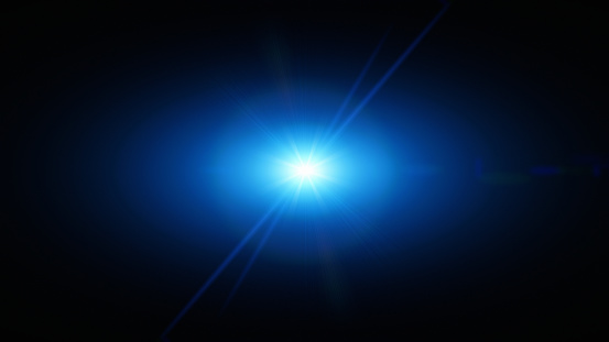Blue lens flare overlay on black background design element