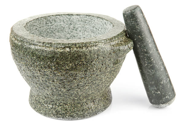 istock Granite mortar used for making sauces, isolated on white 177788662