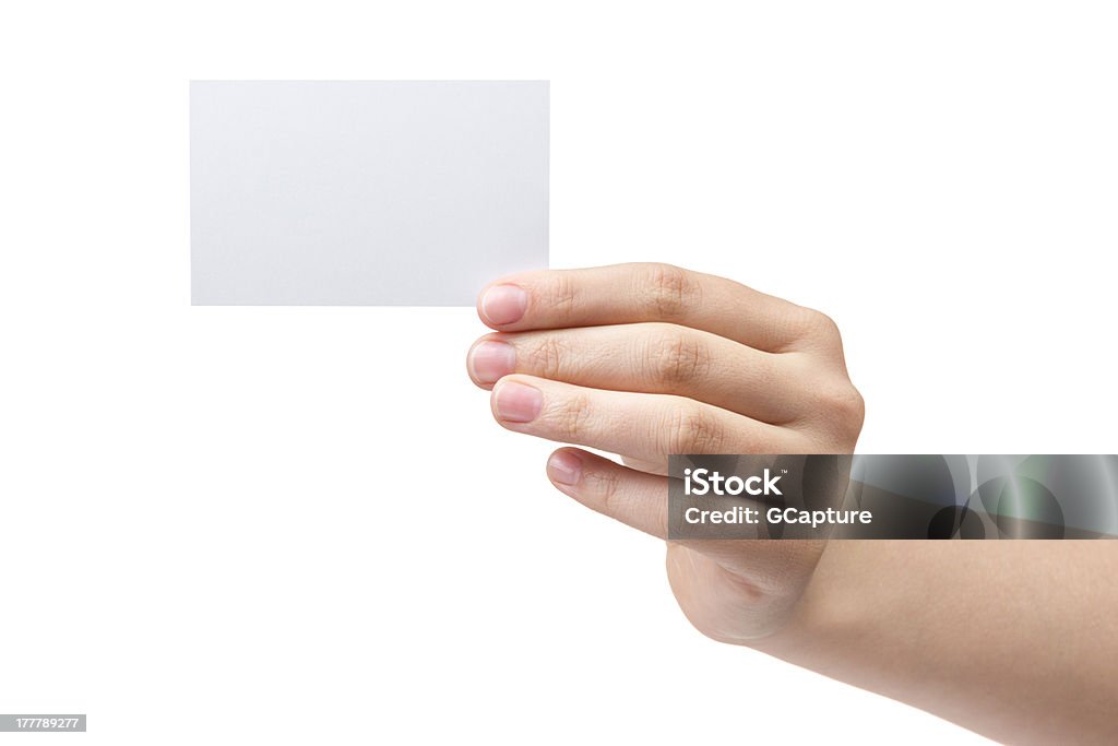 Adolescente feminino Mão segurando o cartão de visita em branco - Foto de stock de Canhoto royalty-free