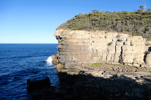 High cliffs at Fossil Bay lookout, Tasman Peninsula, Tasmania, Australia.