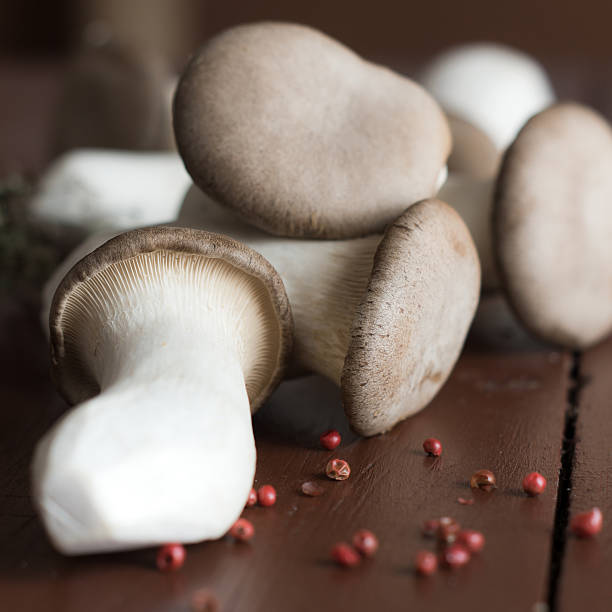 istock king oyster mushroom on a table with red pepper 177789998