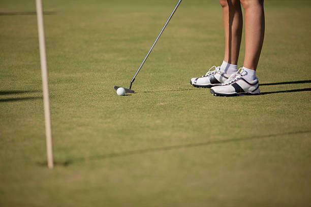 istock Female golfer in the green 177790472