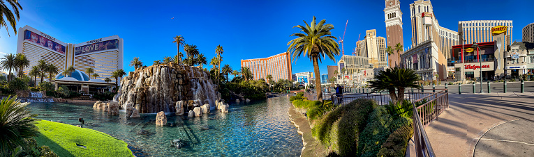 Las Vegas, USA; January 18, 2023: Panoramic view of the volcano at the Mirage hotel and casino and The Venetian on the famous Las Vegas Strip in Sin City.
