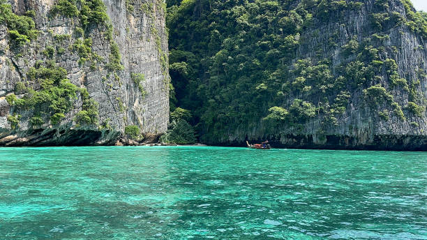 istock Wave, sand beach, and beautiful crystal clear water at Maya Bay in Phi Phi Islands National Park of Thailand. 1777910357