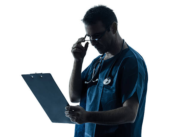 istock doctor man medical exam silhouette 177792040