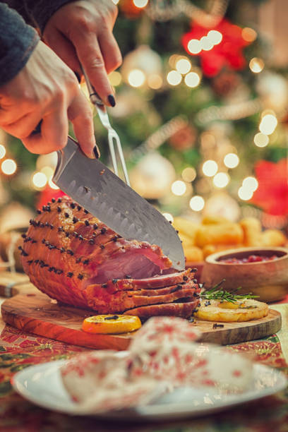 istock Carving Glazed Holiday Ham with Cloves 1777924581