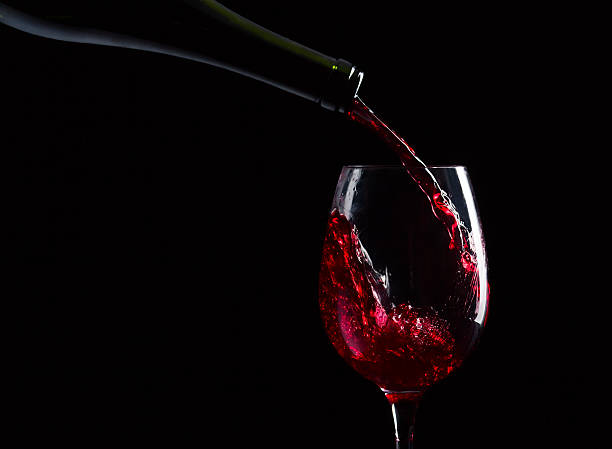 istock bottle and glass with red wine 177792682