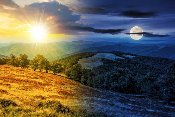 istock mountainous autumn landscape with sun and moon at twilight 1777929690