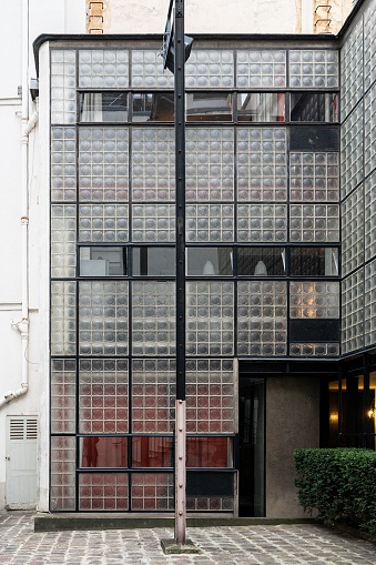 Paris, France – December 01, 2022: The exterior of Maison de Verre, Paris, France, designed by Pierre Chareau