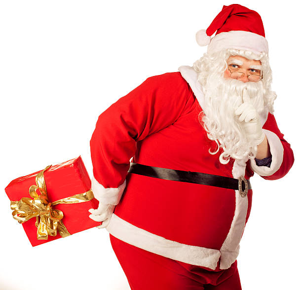 Santa Claus with thamb near mouth stock photo