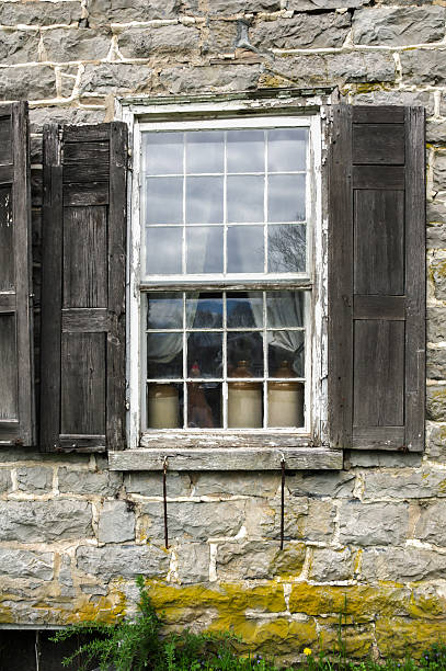 istock Historic Stone House Window with Clay Jugs. 177795274